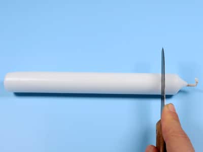 Kerze durchschneiden